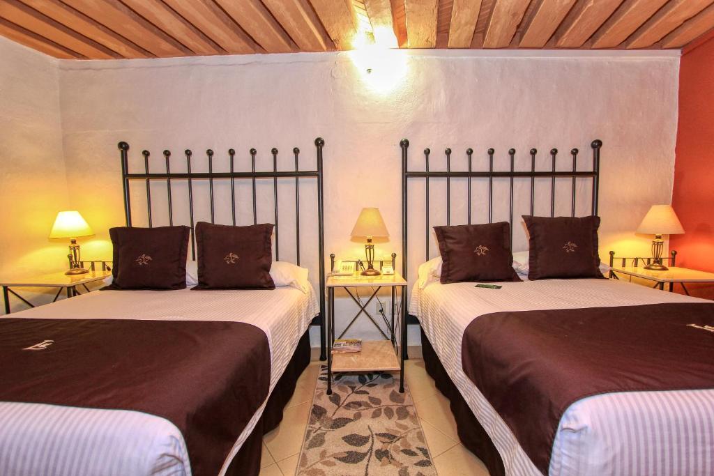 Postel nebo postele na pokoji v ubytování La Casona de Don Lucas
