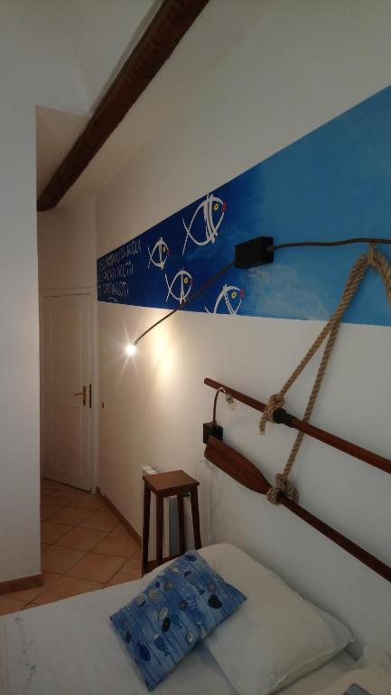 Postel nebo postele na pokoji v ubytování L'Acanto