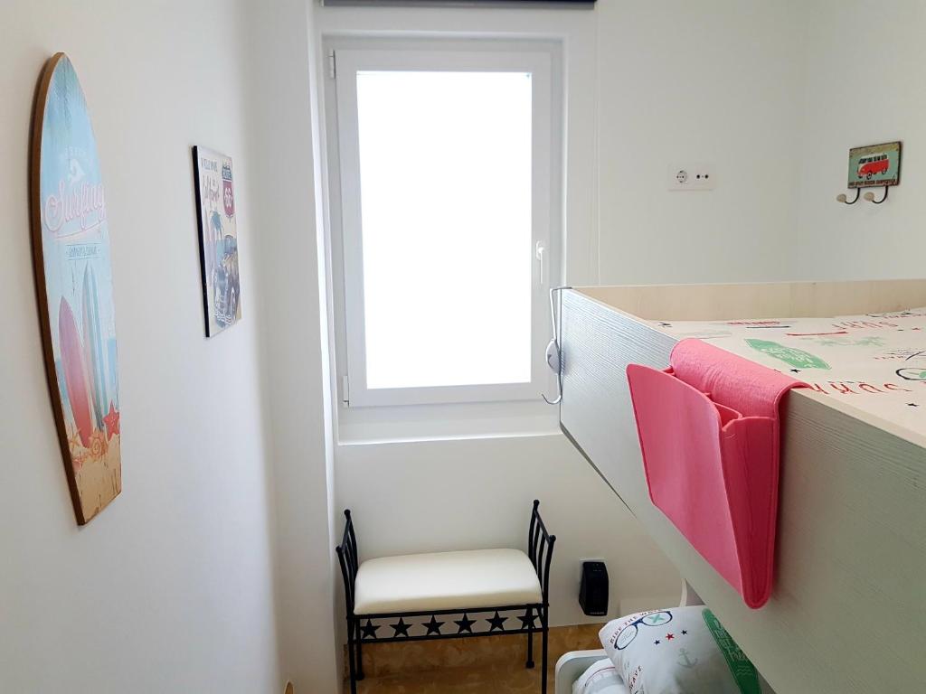 Posteľ alebo postele v izbe v ubytovaní Casa con vistas al mar en A Guarda
