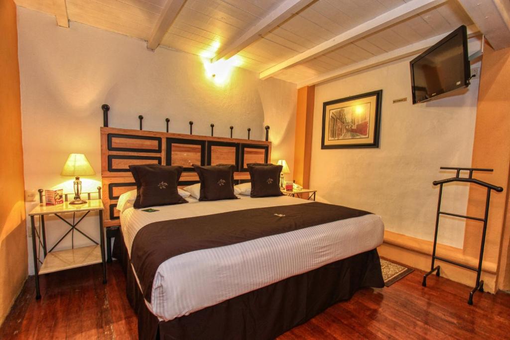Postel nebo postele na pokoji v ubytování La Casona de Don Lucas