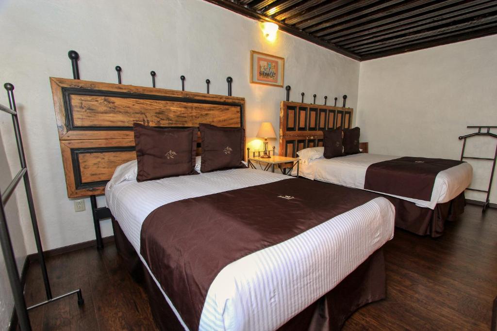 Postel nebo postele na pokoji v ubytování La Casona de Don Lucas