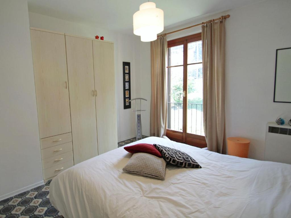 Łóżko lub łóżka w pokoju w obiekcie Apartment Residenza del Pascià by Interhome