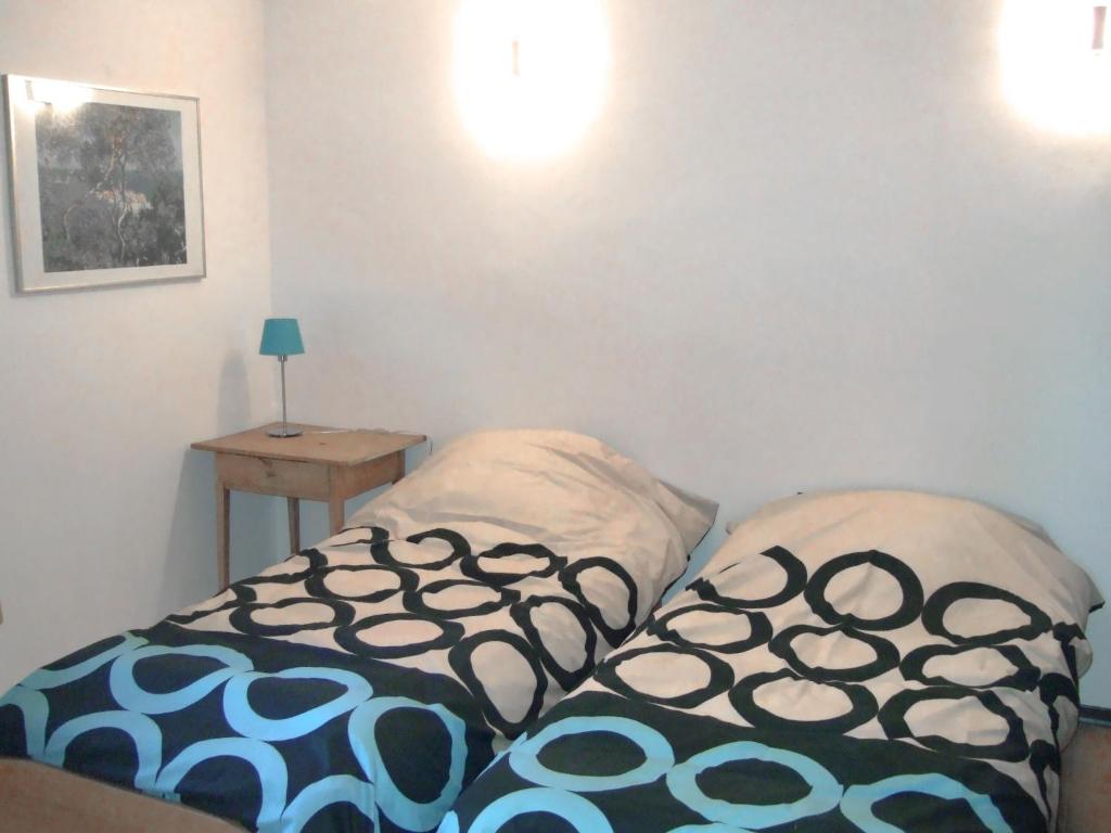 Łóżko lub łóżka w pokoju w obiekcie Apartment Residenza del Pascià by Interhome