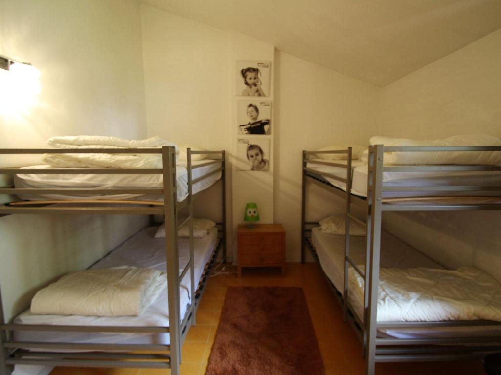 Łóżko lub łóżka w pokoju w obiekcie Apartment Residenza del Pascià by Interhome