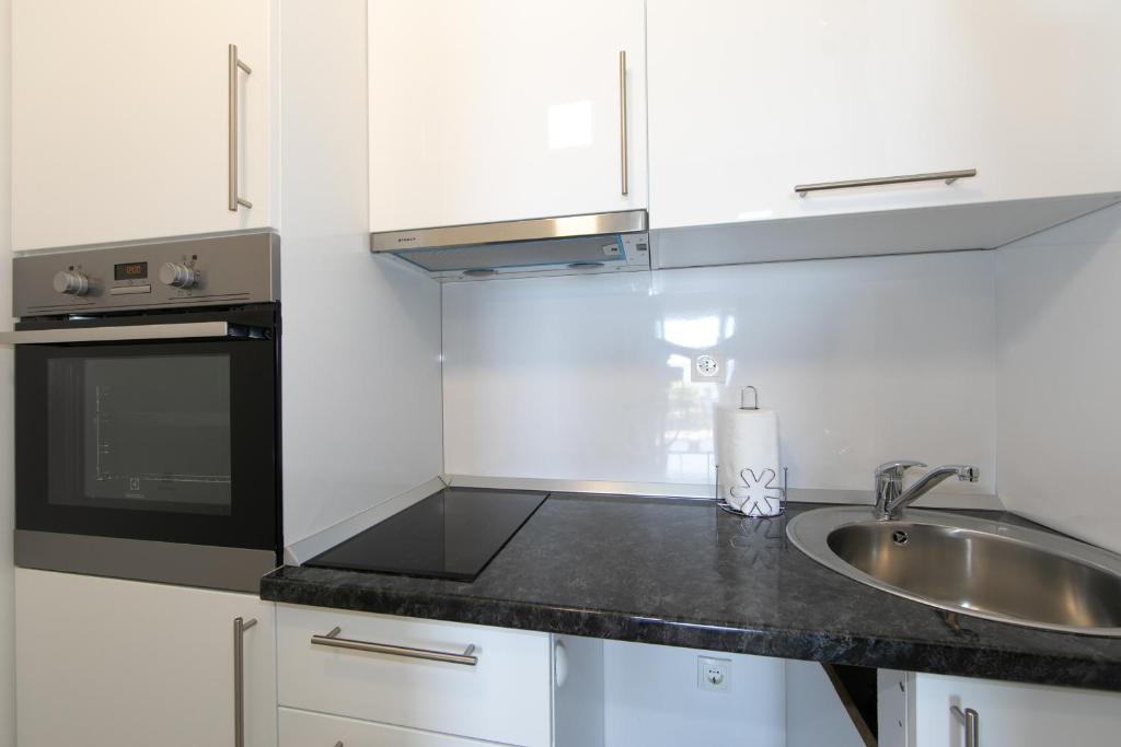Kuchyňa alebo kuchynka v ubytovaní Apartmani Marija Jakir
