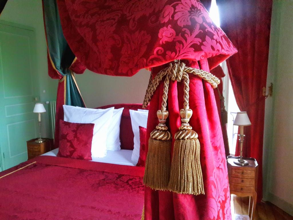 Llit o llits en una habitaci&oacute; de Ch&acirc;teau de Chantore