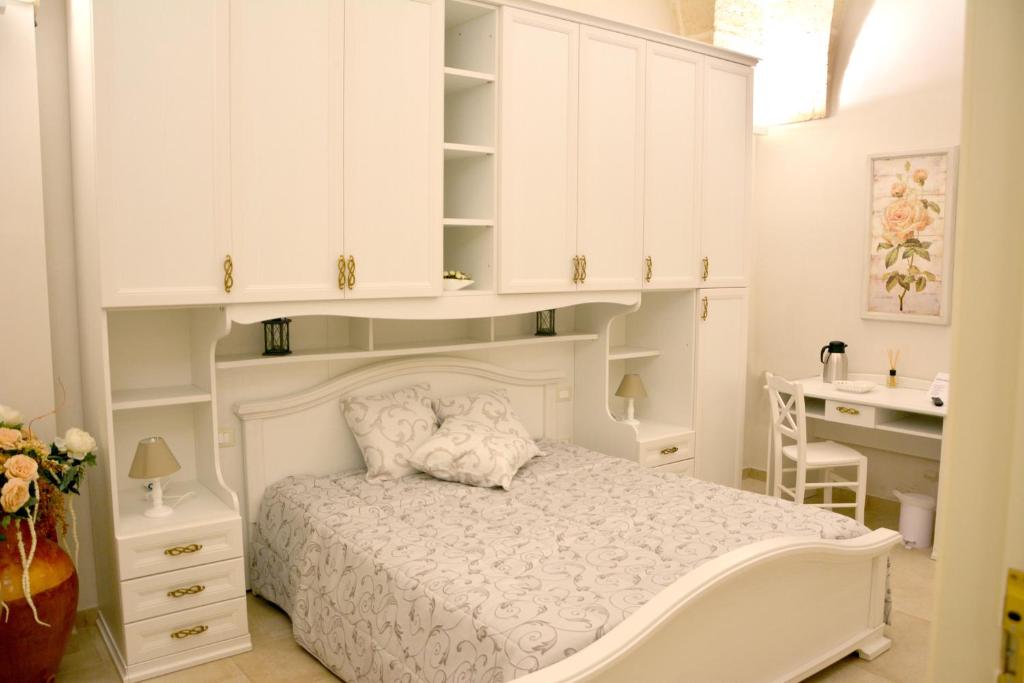 Posteľ alebo postele v izbe v ubytovaní Le Giare B&B