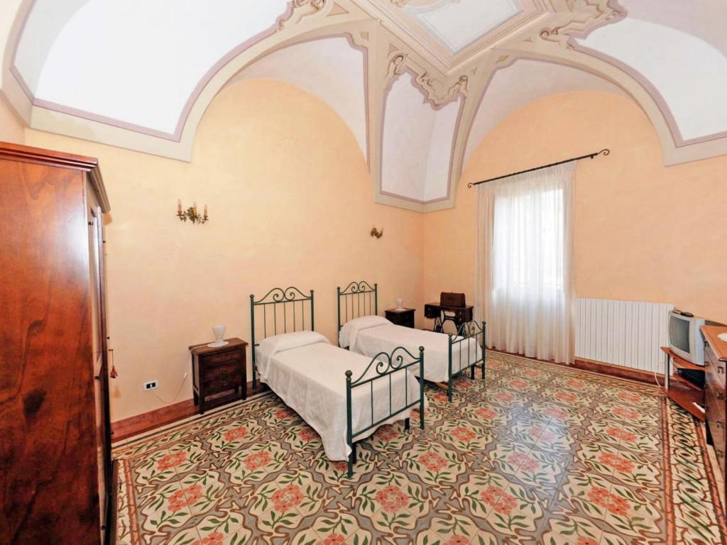 Łóżko lub łóżka w pokoju w obiekcie Apartment Carovigno by Interhome