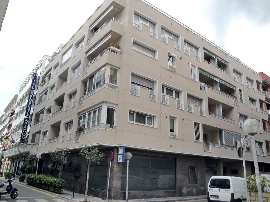 a large building on the corner of a street at Apartment Duplex Iberia by Interhome in Salou