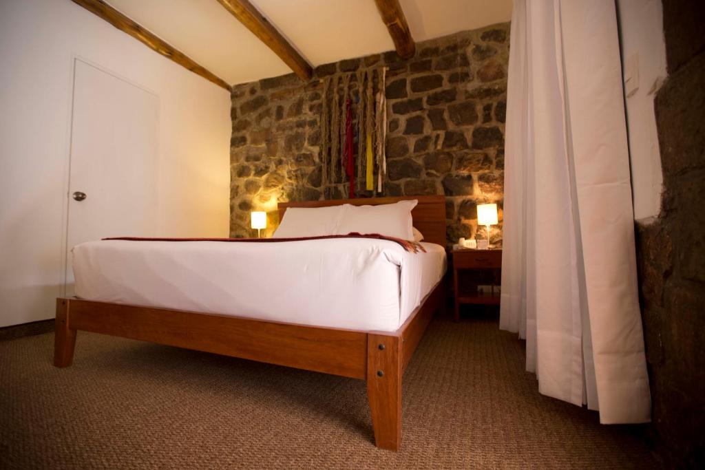 Postel nebo postele na pokoji v ubytování Tierra Viva Cusco Centro