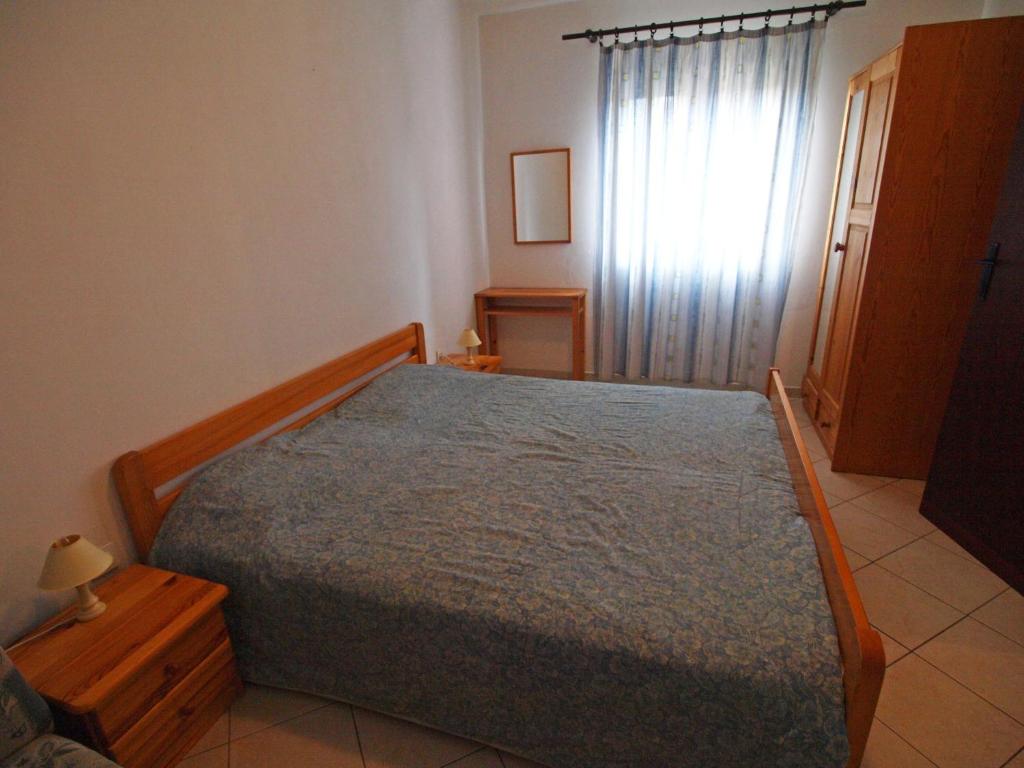 Posteľ alebo postele v izbe v ubytovaní Apartment Romantika-1 by Interhome