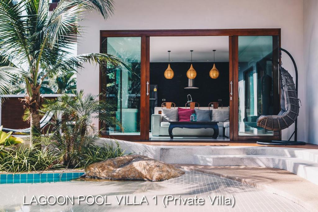 Der Swimmingpool an oder in der Nähe von Coco Lilly Villas