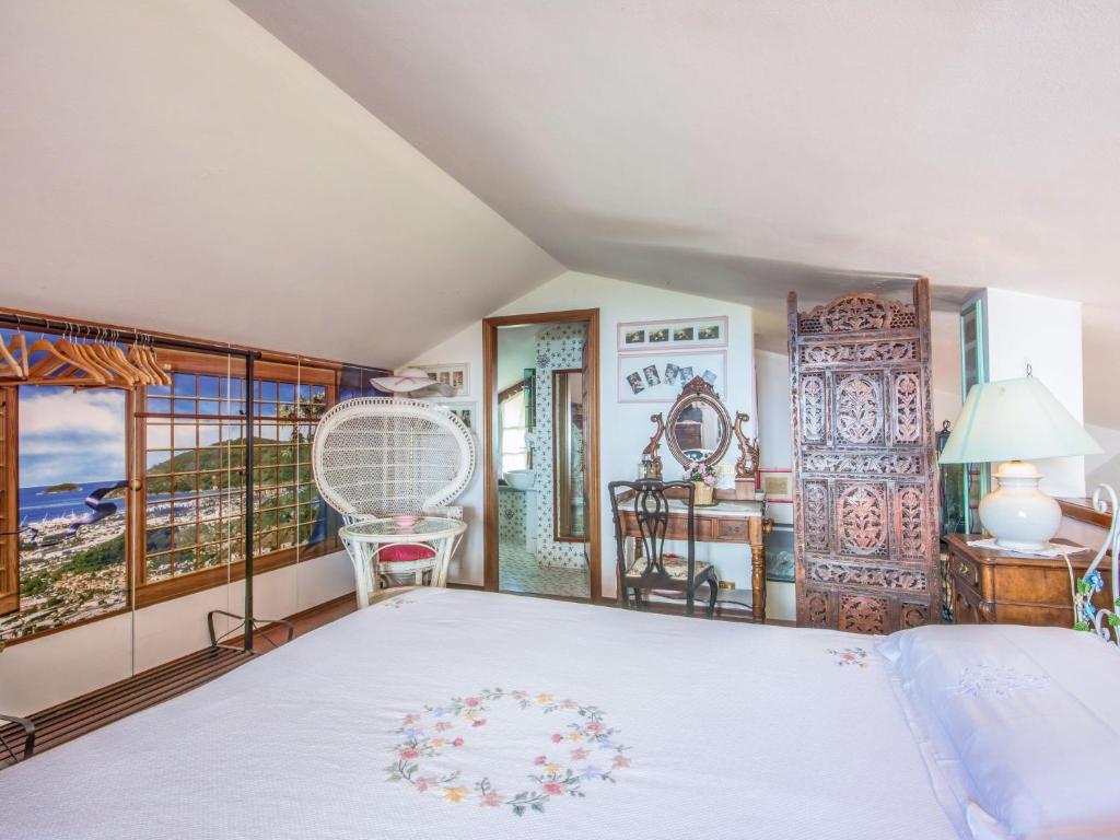 A bed or beds in a room at Holiday Home Villa Poggiobello by Interhome