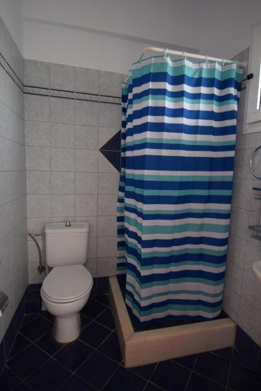 Kúpeľňa v ubytovaní Palmos Self-Catering Apartment with sea view
