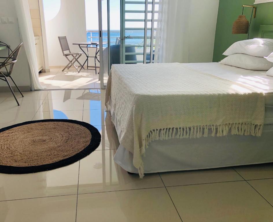 Postel nebo postele na pokoji v ubytování Hotel Pelican