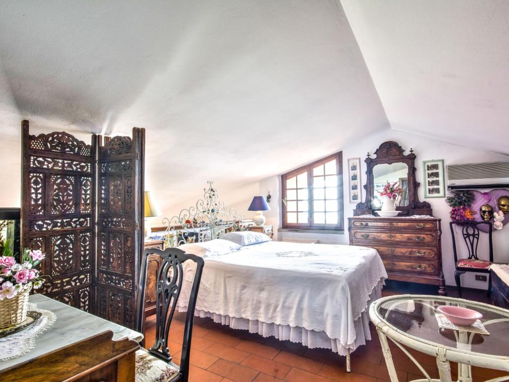 A bed or beds in a room at Holiday Home Villa Poggiobello by Interhome