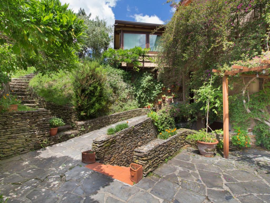 A garden outside Holiday Home Villa Poggiobello by Interhome