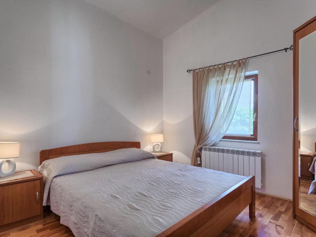 Postel nebo postele na pokoji v ubytování Holiday Home Istra by Interhome