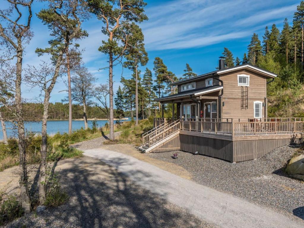 a house on the shore of a body of water at Holiday Home Kärki by Interhome in Houtskari