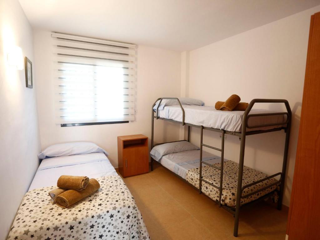 Posteľ alebo postele v izbe v ubytovaní Apartment Mar Cambrils by Interhome
