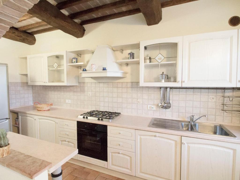 A kitchen or kitchenette at Holiday Home Montecucco Winery by Interhome