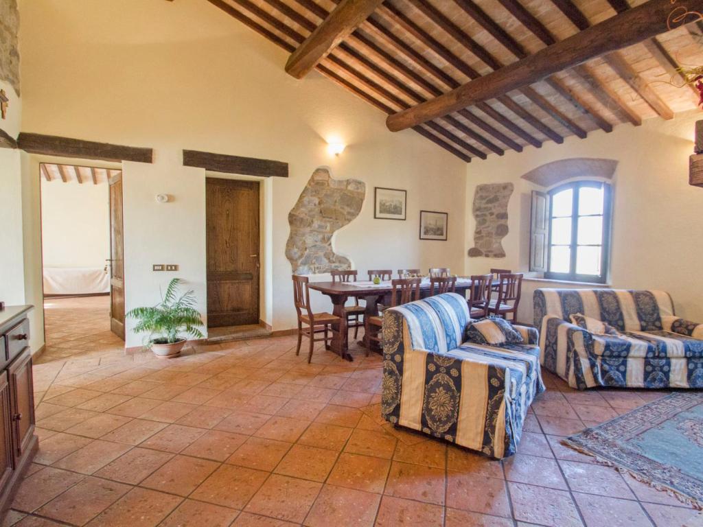A seating area at Holiday Home Montecucco Winery by Interhome