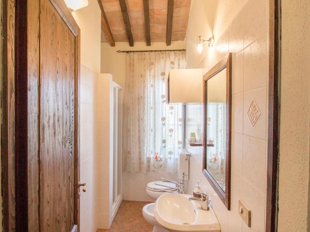 A bathroom at Holiday Home Montecucco Winery by Interhome