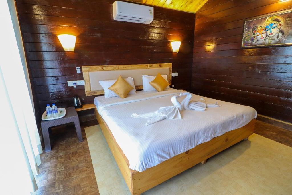Postel nebo postele na pokoji v ubytování JP Resort
