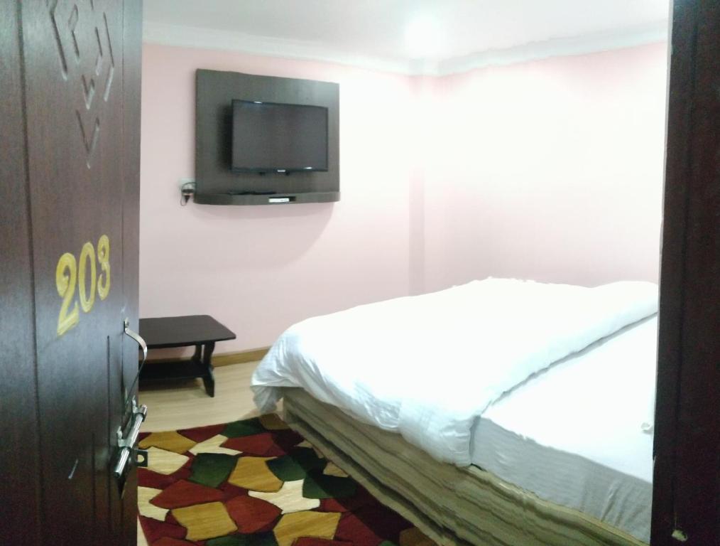 Postel nebo postele na pokoji v ubytování Hotel Samrajya Pvt. Ltd.