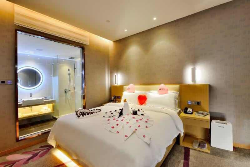 Postel nebo postele na pokoji v ubytování Lavande Hotel Shanghai Jiading Xincheng Stadium Branch