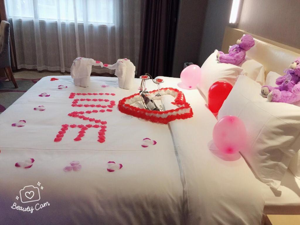 Postel nebo postele na pokoji v ubytování Lavande Hotel Shanghai Jiading Xincheng Stadium Branch