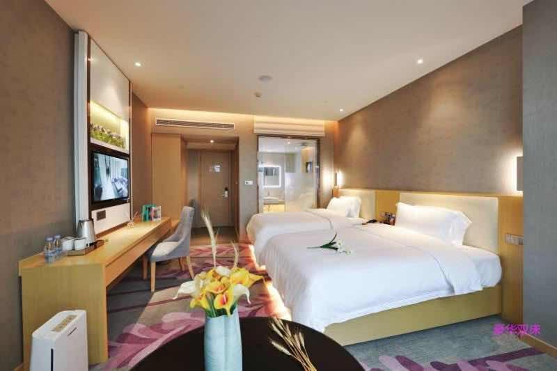 Postel nebo postele na pokoji v ubytování Lavande Hotel Shanghai Jiading Xincheng Stadium Branch