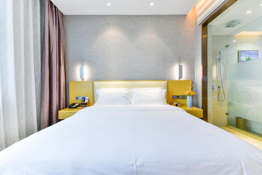 Postel nebo postele na pokoji v ubytování Lavande Hotel Shanghai Jiading Xincheng Stadium Branch