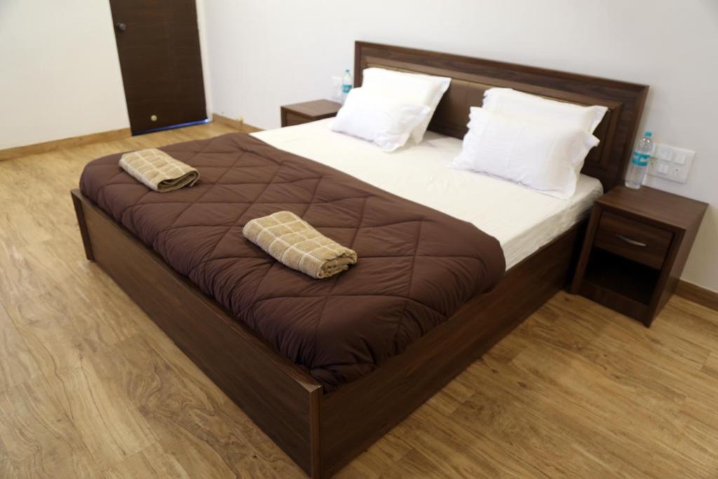 Postel nebo postele na pokoji v ubytování Tripvana Patio Home