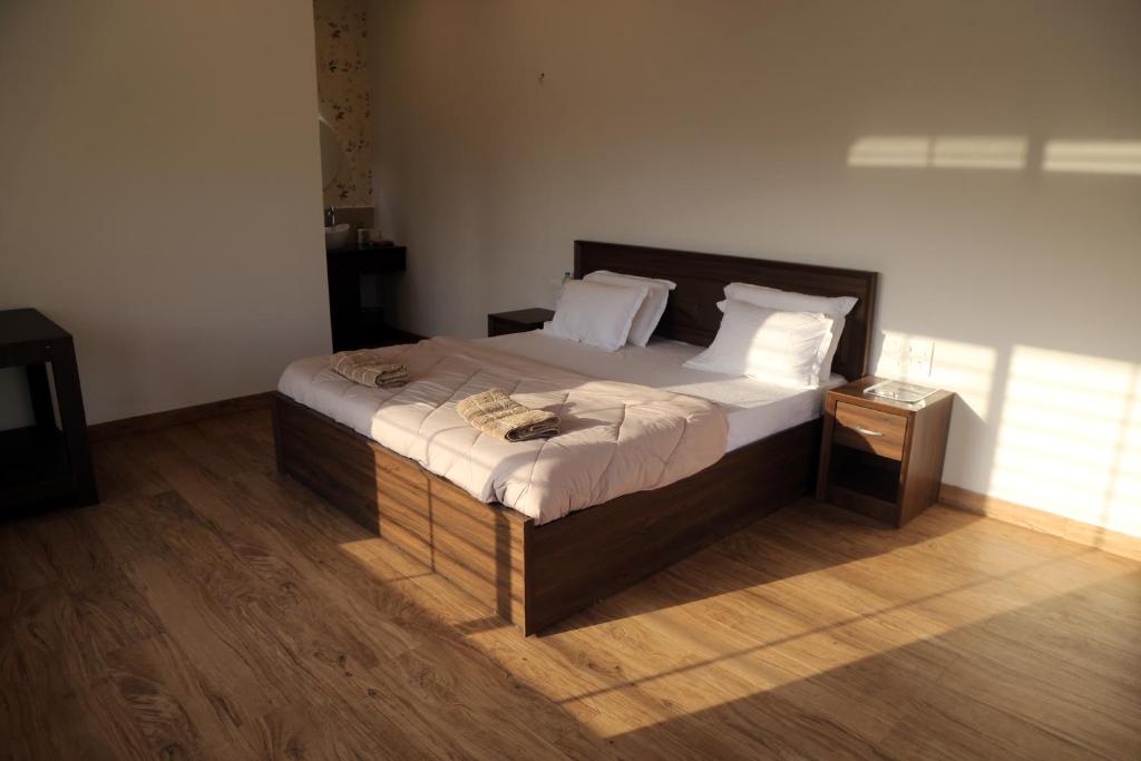 Postel nebo postele na pokoji v ubytování Tripvana Patio Home