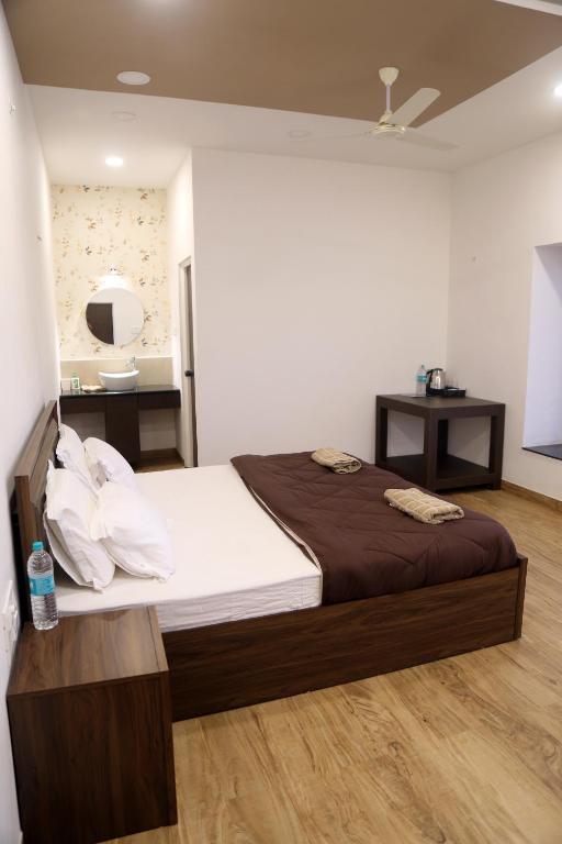 Postel nebo postele na pokoji v ubytování Tripvana Patio Home