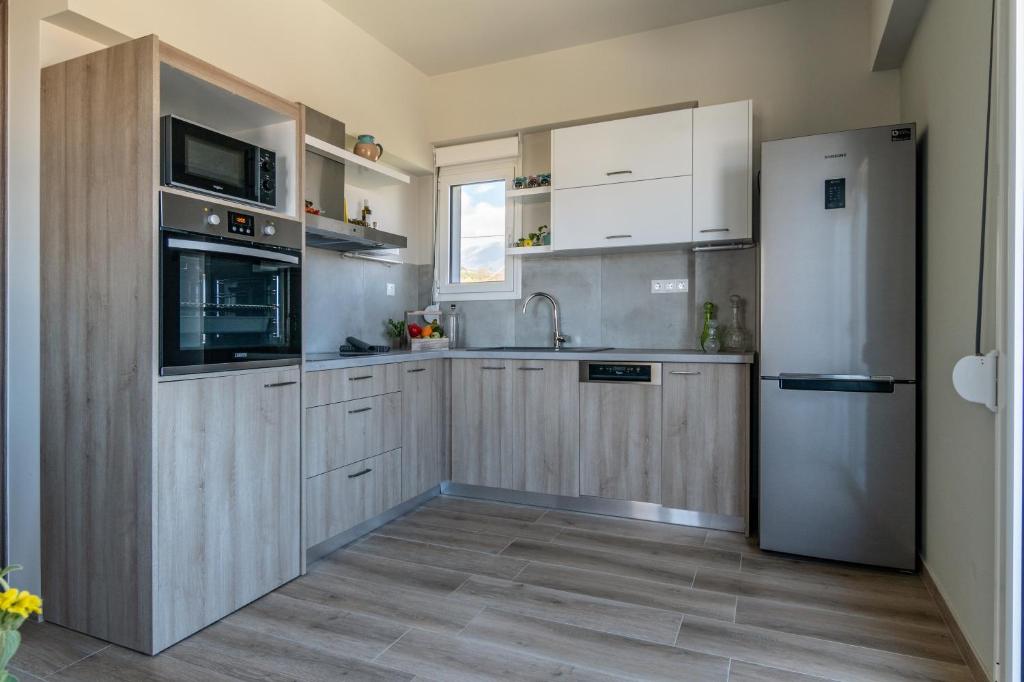 A kitchen or kitchenette at Kyma seaview Apartments, Episkopi beach Rethymno