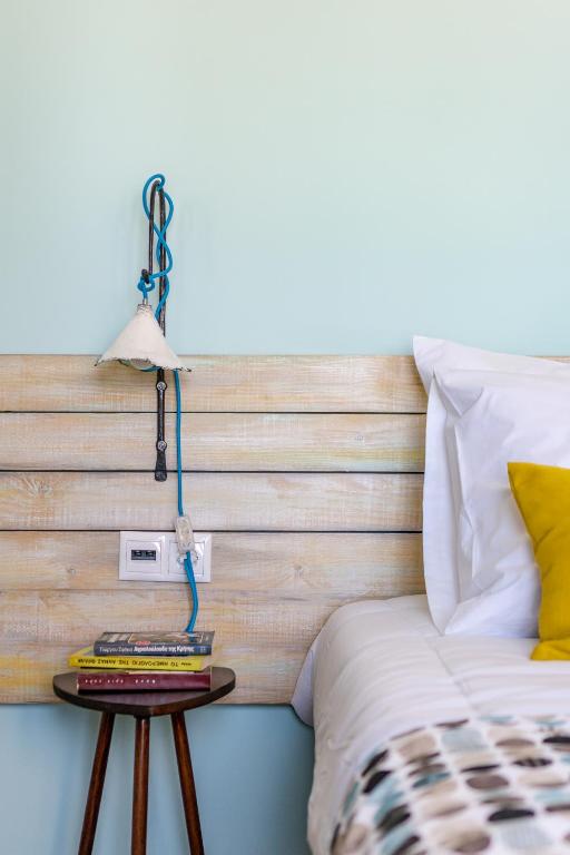 A bed or beds in a room at Kyma seaview Apartments, Episkopi beach Rethymno