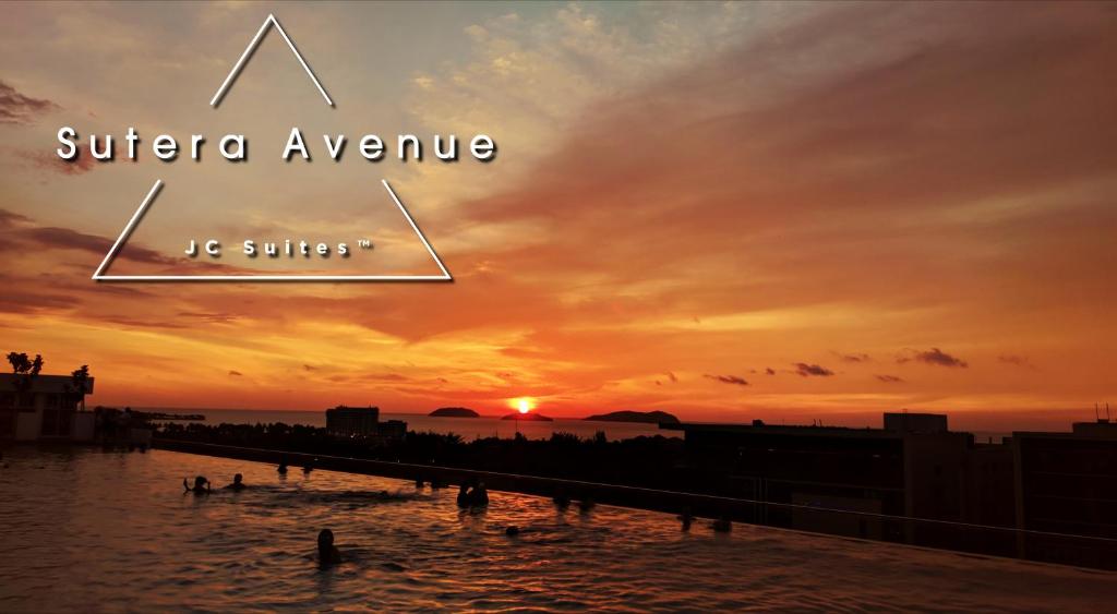 a syria avenue sunset with the words a syria avenue bij JC Suites @ Sutera Avenue in Kota Kinabalu