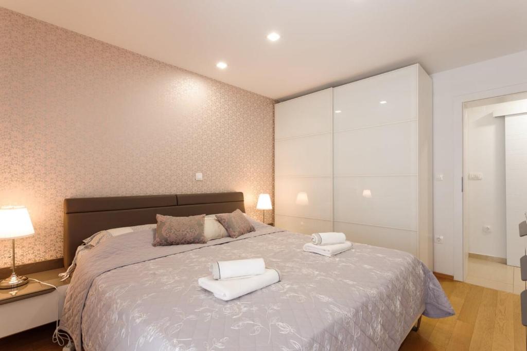 Posteľ alebo postele v izbe v ubytovaní Apartment Gazo