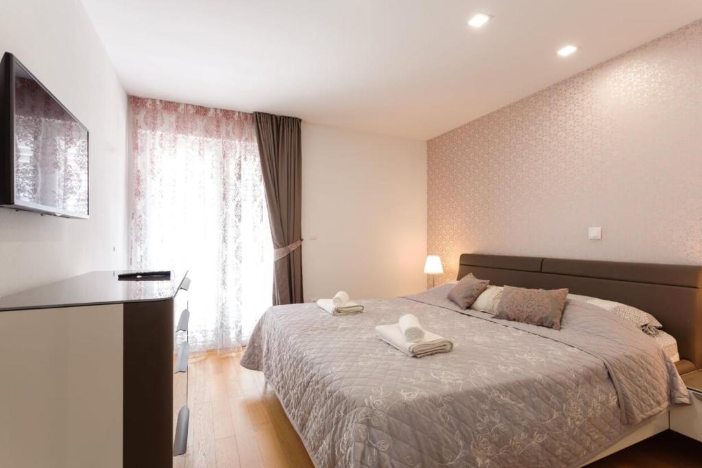 Posteľ alebo postele v izbe v ubytovaní Apartment Gazo