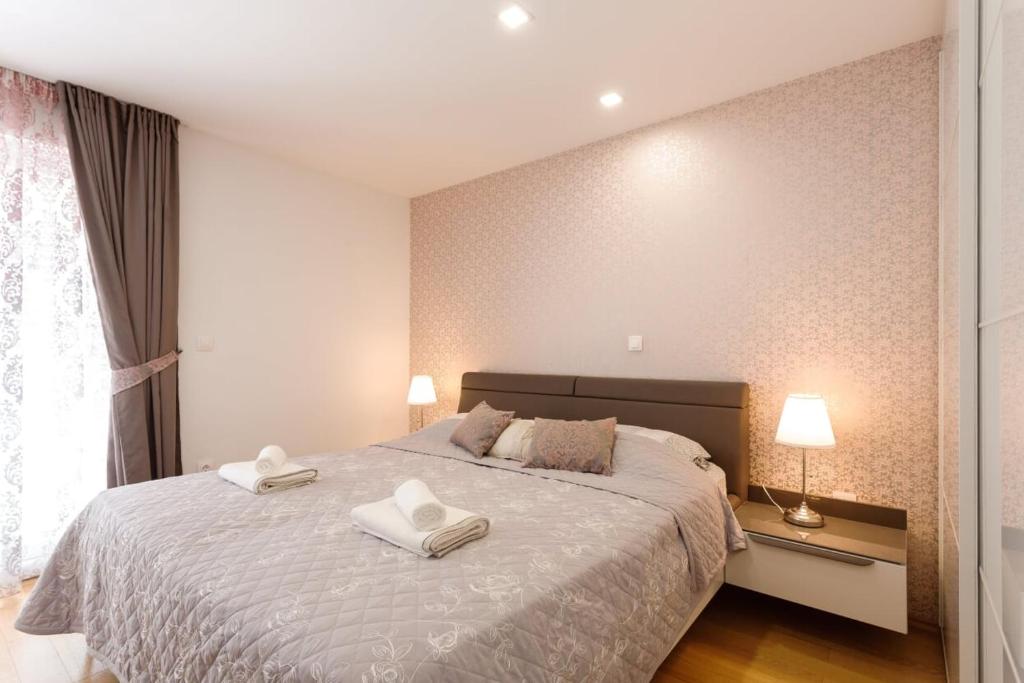 Posteľ alebo postele v izbe v ubytovaní Apartment Gazo