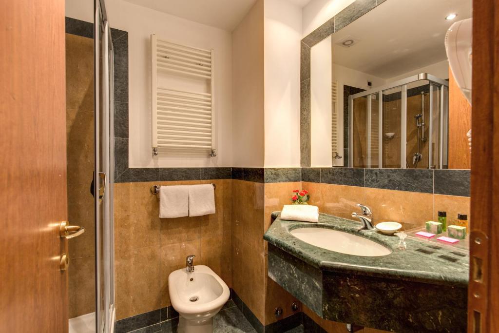 Koupelna v ubytování Hotel Impero