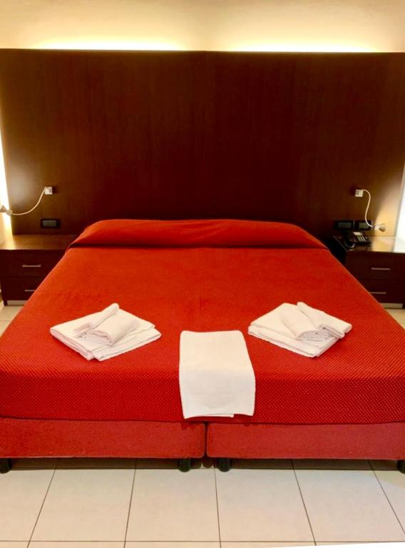 Posteľ alebo postele v izbe v ubytovaní Residence Domus