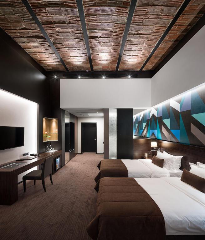 Postel nebo postele na pokoji v ubytování BANKHOTEL