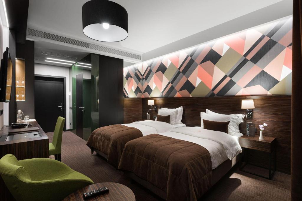 Postel nebo postele na pokoji v ubytování BANKHOTEL