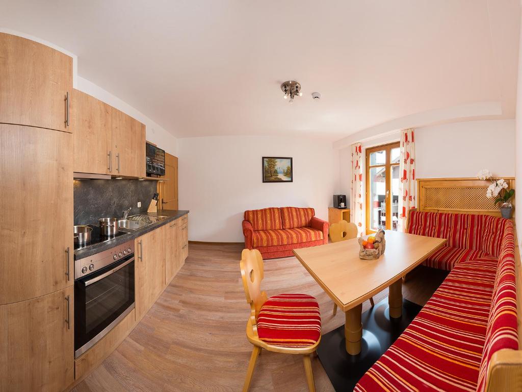 Kuchyň nebo kuchyňský kout v ubytování Apartments Quehenberger