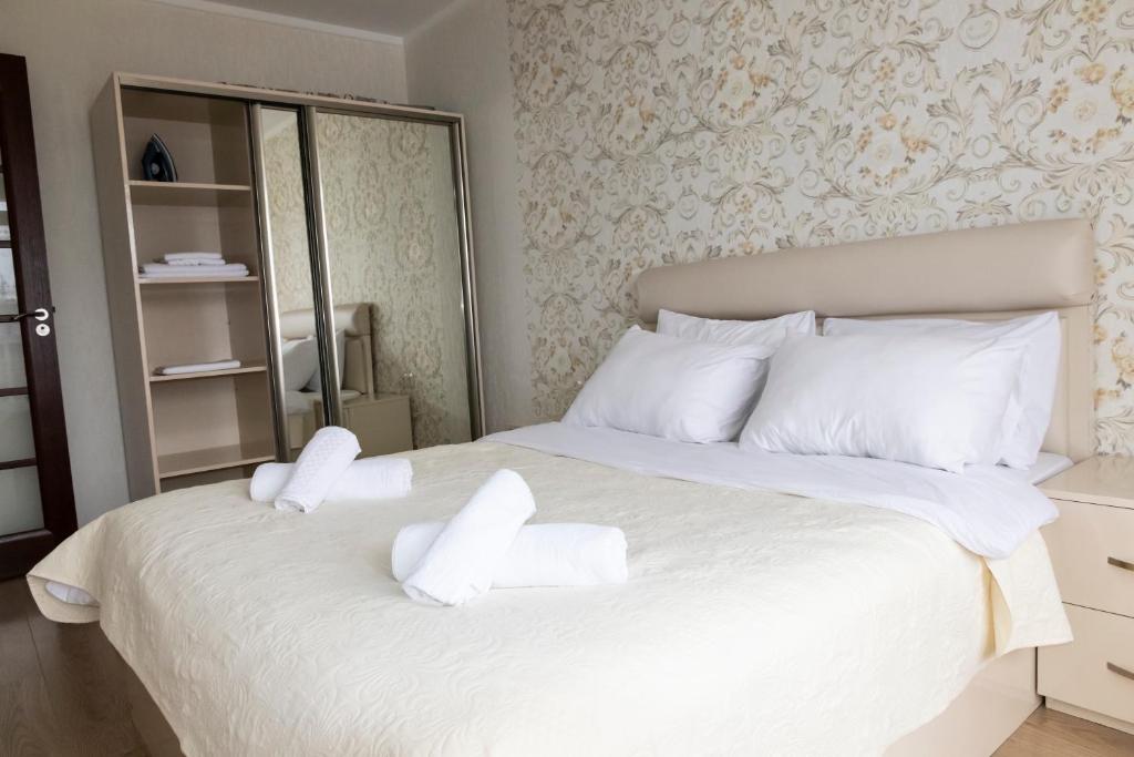 Postel nebo postele na pokoji v ubytování Batumi Orbi Residence Lux