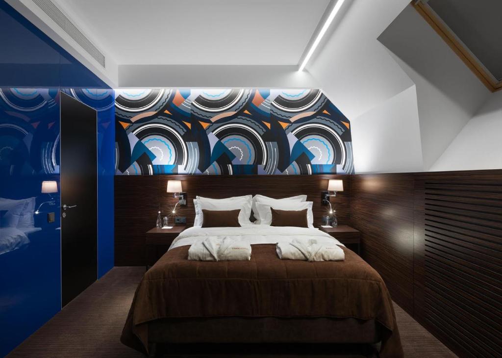 Postel nebo postele na pokoji v ubytování BANKHOTEL