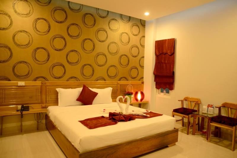 Postel nebo postele na pokoji v ubytování Red Diamond Hotel